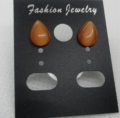 #1074 Handmade Orange Cabochon Teardrop Earrings.. Pierced on hypoallergenic Posts.. $4 plus $4 postage on any order under $20. I make items for every member of the family.. Please visit my website at www.charmedbycharmsbycindy.com Thanks Teardrop Earrings, Family Members, Orange