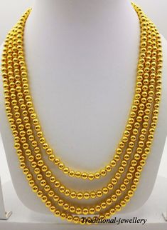 Traditional slop pattern vintage design handmade fabulous 20karat yellow gold beads necklace , bead mala.Each gold beads contains wax inside for durability, Gross Weight-43.500 grams approx. Metal-20karat yellow gold. brand-handmade. condition-excellent condition 4 line necklace. length-adjustable with back thread knot. makes excellent gift item and collection piece for more information please see the photo's gold jewelry is handmade designer jewelry. so, there can be slight difference in size and weight of the article in the comparison of the description. Gold Jewelry With 108 Round Beads, 22k Gold Round Beads Yellow Necklace, Yellow 22k Gold Necklaces With Round Beads, Yellow 22k Gold Necklace With Round Beads, Gold Mala With Round Beads For Festivals, Gold Temple Necklace With Round Beads For Festivals, Gold Polished Beads Mala For Wedding, Gold Temple Jewelry Mala With Round Beads, Gold Temple Necklace With Round Beads