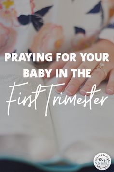 a woman reading a book with the words praying for your baby in the first trimester