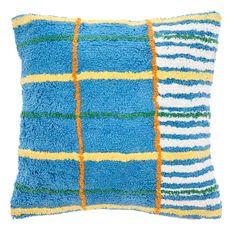 a blue and yellow striped pillow on a white background with the same color as it appears