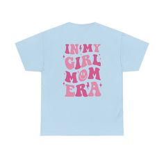 Embrace the #girlmomlife with this fun and comfy graphic tee. Featuring a bold "In My Girl Mom Era" design, this shirt is a perfect way to celebrate raising your daughters. Made from 100% soft cotton, this t-shirt is breathable and relaxed, ideal for busy moms on the go. Whether you're running errands, cheering on your girls at a recital, or just relaxing at home, this tee is sure to become a staple in your wardrobe. Mom Era, 15 Gifts, Just Relax, Girl Mom, Busy Mom, Bridal Accessories, Running Errands, Mom Life, The Go