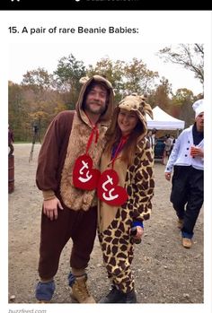 two people dressed in animal costumes standing next to each other at an outdoor event together