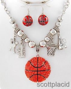 a necklace and earring set with basketball charms