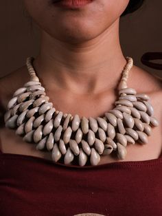 Channel your inner goddess with our Ujjain shell necklace. This boho style piece features natural cowrie shells and an adjustable hook for a free-spirited, carefree look. Perfect for bohemian babes and free people enthusiasts. (Can you say beach vibes?!) One size fits all. Get yours today! Beach Goddess, Boho Style Design, Cowrie Shells, Inner Goddess, Shell Necklace, Cowrie Shell, Free Spirited, Beach Vibes, Boho Stil