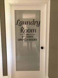 the laundry room is open for 24 hours sign on the door reads,'laundry room set to serve open 24 hours '