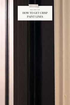 a black door with a sign that says how to get crisp paint lines on it