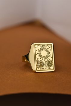 Welcome to LUXJ, Here you will find a beautiful selection of rectangle signet rings with a variety of designs such as our sun tarot card signet ring. Our team is happy to assist you with any questions you may have and we look forward to creating these special jewelry for you. *The images are taken from us and you will receive your ring as shown* | Information about the ring | - Face Size: 16x12mm - Band width at the bottom: 3mm | Material | - Sterling Silver 925 - Gold Vermail (925 base) - 9K Re Sun Signet Ring, Handmade Rectangular Signet Ring For Gift, Adjustable Rectangular Signet Ring As Gift, Adjustable Rectangular Signet Ring Gift, Tarot The Sun, Silver Signet Rings, Card Ring, Sun Tarot Card, The Sun Tarot Card