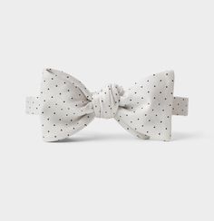 Classic White Bow Ties, Classic White Bow With Ties, Elegant White Bow Tie For Business, Elegant Polka Dot Ties, White Formal Bow Suit And Tie Accessories, Classic White Bow Tie With Detachable Bow, White Bow Suit And Tie Accessories For Formal Occasions, White Dapper Bow Tie For Formal Occasions, White Detachable Bow Tie For Black Tie Events