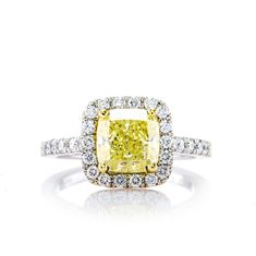 a yellow and white diamond ring