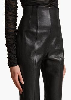 A high-waisted leather cigarette pant designed for a corset-like fit and shaped by darts. With concealed zipper closures at side and ankles. High Waisted Leather Pants, Black Leather Outfit, Corset Pants, Lined Pants, Leather Outerwear, Wardrobe Edit, Denim Shoes, Pants Design, Leather Outfit