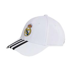 the real madrid cap is white with black stripes and an embroidered crest on the front