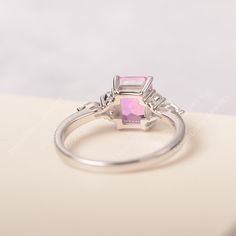 All HANDMADE ITEMS SHIP IN APPROX 8 DAYS Main Stone: Lab created pink sapphire Main Stone Size: Emerald cut 6 mm x 8 mm Main Stone Weight: 1.75 carat Side Stone: CZs Height From The Ring Setting Bottom(to gemstone top): about 5.13 mm Width of Ring band Measure: gradually varied,about 1.67 to 1.91 mm Material: .925 Sterling Silver/14K White Gold/14K Yellow Gold/14k Rose Gold Engraved: Available For FreeNo more than 13 letters) Customized:Of course! Tell me what you want Includes With Order: All o Blue Topaz Ring Silver, Emerald Cut Sapphire Ring, Rectangle Ring, Ring Emerald Cut, Pink Sapphire Ring, Wedding Rings Solitaire, London Blue Topaz Ring, Ring Emerald, Gold Engraving