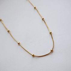 Our Satellite Choker Necklace is a perfect blend of classic and contemporary. The lightweight and classic design ensures all-day comfort and effortless style. - stainless steel, gold plated- 15" in length with 2" extender Minimalist Gold Stainless Steel Chain Necklace, Modern Gold Necklaces For Everyday, Dainty Gold Necklace For Everyday Use, Elegant Metal Necklace For Everyday Use, Modern Gold Necklace For Everyday, Modern Gold Jewelry For Everyday Use, Modern Gold-tone Necklace For Everyday, Minimalist Yellow Gold Stainless Steel Chain Necklace, Elegant Everyday Metal Necklace