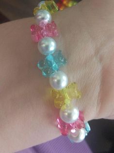 Gummy bear bracelets. Each order is one bracelet. Choose from rainbow, coquettish pink, or your own custom colors. They stretch to fit most hands :) Gummy Bear Bracelet, Coquette Bracelet, Kawaii Bracelet, Kandi Bracelets, Pink Rainbow, Gummy Bear, Bracelet Ideas, Gummy Bears, Pink Bracelet