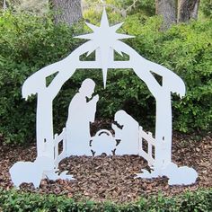 a nativity scene with the birth of jesus and baby jesus in a manger