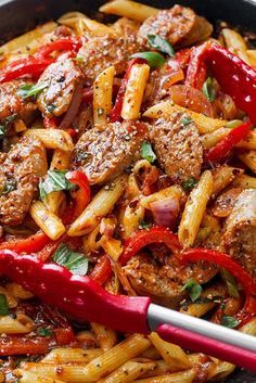 pasta with meat and peppers in a skillet