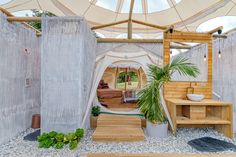 the inside of a tent with plants in it