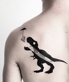 a man with a lizard tattoo on his chest holding an umbrella and flying a kite