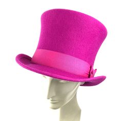 Women top hat handmade in fuchsia wool felt. Crown shapped in pork pie style. Edwardian top hat ideal for special occasions such as weddings, cocktails or parties. You can make your hat with your favorite color by choosing it from my Wool felt color card. Measurements in centimeters are 31 x 25. Crown height 15. Brim length 5. These measurements may have some slight variation depending on the size of the hat. The end of the brim is reinforced inside with a fine wire covered with cotton thread to Top Hats For Women, Card Measurements, Felt Crown, Black Top Hat, Woman Top, Crown Heights, Pork Pie, Top Hats, Hat Handmade