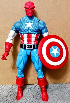 the captain action figure is posed with his shield