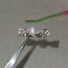 ⭐100% NATURAL PHOTOS ⭐Brand- AS jewellers ⭐Country/Region of Manufacture: India ⭐Material- Sterling Silver ⭐Metal Purity : 925 parts per 1000 ⭐Main Stone: White Star Sapphire ⭐Main Stone Creation: Natural ⭐Size Of Stone= 6x4mm ⭐Main Stone Weight : (1.00)Carat Approx. ⭐Stone Origian : Srilanka { Ceylon } ⭐Nature of stone: The Stone will show star When any source of Light Fall it. The source Should be pointed And strong Example Mobile flesh, Sun light, Torch. ⭐We Provide Three Platting- Sterling S Star Engagement Ring Silver, Light Fall, Oval Sapphire Ring, Star Sapphire Ring, Purity Ring, Promise Ring Gift, Sun Light, Star Sapphire, White Star