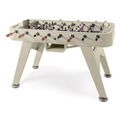 an old style foosball table is shown on a white background