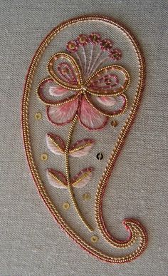 the embroidery work is done in pink and gold