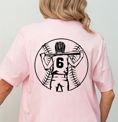 Softball Girls T-Shirts, Personalized Softball Girls Shirts, Custom Softball Shirt, Softball Lover Shirt, Softball Season Shirt Gift for Her Welcome to TEASHIRT2000! Product Details: For our printing, we've carefully selected Bella Canvas and Gildan SoftStyle brand shirts, renowned for their exceptional quality in the industry. Bella Canvas:     * Available in unisex sizes     * Lightweight at 4.2 oz.     * Solid colors crafted from 100% Combed Cotton and Ring-Spun Cotton.     * Athletic Heather Pink T-shirt For Baseball Season With Team Name, Pink Tops For Baseball Game Day, Pink Graphic T-shirt For Baseball Season, Pink Graphic Print T-shirt For Baseball Season, Pink Screen Print Top For Sports Events, Pink Short Sleeve T-shirt For Sports Events, Pink Sporty T-shirt For Cheerleading, Sporty Pink T-shirt For Cheerleading, Custom Softball Shirts