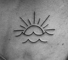 a sun and cloud tattoo on the chest