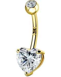 a gold heart shaped belly ring with a clear stone