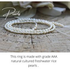 This little chain ring offers a fresh take on a traditional band ring. It is also very lightweight and comfortable to wear.  D E T A I L S *Made with AAA grade cultured freshwater rice pearls. These are very small measuring between 2- 4mm x 1.5mm. *Choose between a 14k gold filled, rose gold filled or sterling silver chain. *Gold fill is a wonderful alternative to gold and unlike gold plating does not rub off. *Choose the size you prefer from the drop down menu.  *Ring comes with a matching crystal information card and is ready for gifting. S I Z I N G * H E L P:  The the most accurate way to determine your ring size is to be professionally measured by a jeweller.  There are also several at-home sizing tools and tips to help find your ring size. The MOST COMMON RING SIZES for women are siz Dainty White Hypoallergenic Pearl Ring, Dainty Wedding Pearl Ring With Pearl Chain, Dainty Adjustable Hypoallergenic Pearl Ring, Dainty Pearl Ring With Round Beads, Adjustable White Pearl Ring With Pearl Charm, Freshwater Pearl Ring, Gold Filled Ring, Chain Ring, Minimalist Rings