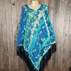 Teal Aqua Blue Multi Hand Crochet Poncho Sweater Hand Crocheted By Me Medium Weight Acrylic Yarns Fringe All The Way Around The Bottom One Size Fits Most Xs To 1x Approx 24 - 36" Long Hand Wash And Lay Flat To Dry Crafted In Smoke Free Home **Visit My Shop For Other Colors Available** #1120ba B5 Blue Winter Festival Poncho, Blue Shawl Poncho For The Beach, Blue Shawl Poncho For Beach, Bohemian Blue Cape Poncho, Blue Crochet Bohemian Poncho, Blue Bohemian Crochet Poncho, Bohemian Blue Crochet Poncho, Blue Fringe Poncho One Size, One Size Blue Poncho With Fringe