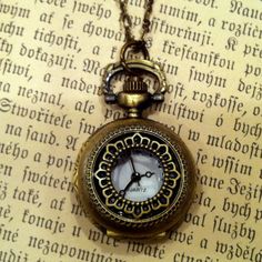 Small 25mm pocket watch necklace with a high quality quartz movement inside.On 26 inches of antiqued brass chain. If you'd like 2 little Victorian birds on the chain like some of my other listed watches have just let me know.I can make this chain any length for no extra charge. Just leave me a note at checkout!You can adjust the time by pulling up the knob and turning.Pressing the knob opens the watch. Celtic Tattoo Symbols, Nerd Jewelry, Pocket Watch Tattoos, Geometric Tattoo Arm, Celtic Tattoo, Typewriter Keys, Pendant Watch, Pocket Watch Necklace, Mechanical Pocket Watch