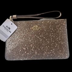 Bnib W/ Tags Star Glitter Rose Gold Leather Wristlet This Coach Wristlet Is Pristine, Never Used, Tags Attached, In The Box And Ready To Ship. Great For The Holidays Features A Zip Closure Approx 7 X 4" *Comes From A Smoke Free Home *Comes From A Pet Free Home *Purchase With Confidence, Downsizing My Wardrobe B8 Coach Gold Rectangular Wristlet, Gold Rectangular Coach Wristlet, Elegant Gold Coach Wristlet, Coach Gold Clutch Wristlet, Gold Coach Clutch Wristlet, Coach Gold Wristlet For Everyday Use, Gold Coach Wristlet For Everyday, Glitter Rose Gold, Home Purchase