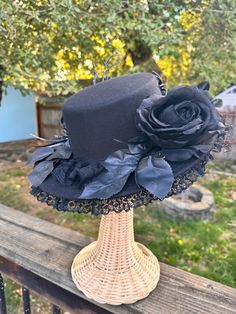 Elevate your style with this Boater Hat. This accessory features black lace adorned with roses, creating a dramatic yet sophisticated look. Perfect for adding a touch of gothic charm to any outfit, whether for a themed event or a unique everyday statement. Crafted with quality materials for durability and comfort, this hat is sure to turn heads and capture hearts. Embrace your individuality and let your style flourish with this enchanting piece. Boater Hat, Rose Black, Panama Hat, Black Lace, Halloween Shopping, Caps Hats, Accessories Hats, Beauty Book, Bathing Beauties