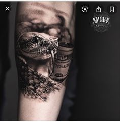 a man's arm with a snake and coffee cup tattoo on the left forearm