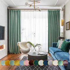 a living room filled with furniture and colorful curtains