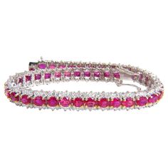 Ruby & Classic Three row Tennis. 10.26ct. Natural ruby bracelet. oval, full cuts Clean clarity Transparent & Vivid Reds. Average 3.5 X 3mm each 3.55ct Diamonds Rounds & full cuts Vs-2 clarity. G-color 14kt. white gold 15 Grams. Bracelet: 6.75mm wide 7 inch wearable length safety clasp/ snap lock $20,000 Appraisal Certificate will accompany.