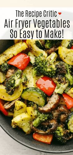 a pan filled with vegetables on top of a table