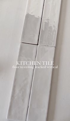 the kitchen tile is being painted white