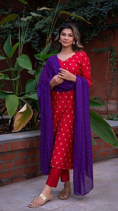 Bring on the festive spirit with our kurta set in hand embroidered chanderi silk. Fully lined kurta and pants. Made in chanderi silk. Dupatta in mul cotton with gold tikki details. Color of Kurta + Pants : Red. Color of Dupatta : Purple. Model height is 5.6” and is wearing a size S. Wash Care : Dry Clean Only. Kurti Dress Designs, Rings Indian, Color Kurti, Suits For Women Indian, Kurta And Pants, Silk Kurta Set, Kurta Pants, Indian Kurti Designs, Red Kurta