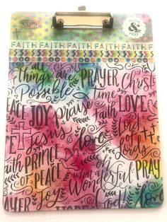 a clipboard with some writing on it and the word faith written in different colors