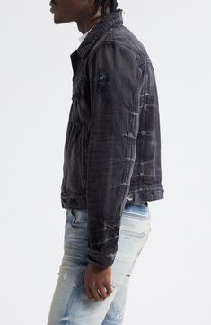 Designer Mike Amiri puts a distinct twist on an Americana icon with a hand-distressed denim jacket featuring slanted seams forming a statement-scale monogram. 28 1/2" length (size medium) Hidden front-snap closure Spread collar Snap cuffs Chest flap-patch pockets; front welt pockets Adjustable snap side tabs 100% cotton Dry clean Made in the USA Designer Clothing Edgy Washed Black Distressed Denim Jacket, Distressed Washed Black Cotton Denim Jacket, Distressed Cotton Denim Jacket In Washed Black, Fitted Washed Denim Jacket For Streetwear, Ripped Denim Jacket For Urban Streetwear, Edgy Dark Wash Washed Denim Jacket, Ripped Denim Jacket For Streetwear, Edgy Ripped Denim Jacket For Streetwear, Edgy Distressed Dark Wash Denim Jacket