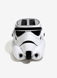 a star wars helmet shaped like a stormtrooper is shown in this image, it appears to be an electronic device