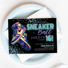 a sneaker ball birthday party is on the table next to a paper plate with confetti