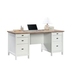 a white desk with drawers and a laptop on it's top, next to a lamp