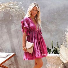 Gorgeous Semi Sheer Flowy Cover Up Dress * Ruffle Short Sleeve * Adjustable Tie Waist * Button Front Skirt * Unlined, Lightweight & Breezy * Raw Ruffled Edges & Hem * Hidden Side Pockets Approx. 32" Long From Shoulder Seam Fits Multiple Sizes Small Medium Large Extra Large Xl Color Fuchsia Magenta Purple Pink Also Available In White, Red & Light Blue #Babydoll Empire Dress Spring Summer Fall Festival Spell Gypsy Casual Vacation Coastal Flirty Lingerie Short Beach Bunny Resort Photo Shoot Materni Chic Flutter Sleeve Mini Dress For Beach, Chic Purple Mini Dress For Summer, Flowy Purple Mini Dress For Beach, Flowy Purple Mini Dress For The Beach, Feminine Purple Mini Dress For Beach, Feminine Purple Mini Dress For Vacation, Purple V-neck Ruffled Mini Dress, Purple V-neck Summer Dress, Summer Purple V-neck Dress