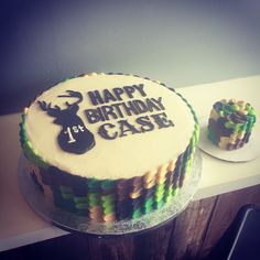 a birthday cake with the words happy birthday case on it next to a cupcake