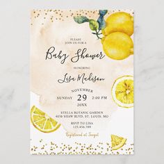 a baby shower with lemons and leaves on it