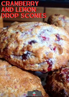 cranberry and lemon drop scones are stacked on top of each other in a pile